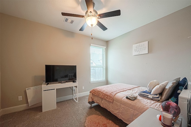 2625 Blooming Field Ln, Conroe, TX 77385 - carpeted bedroom with baseboards and ceiling fan