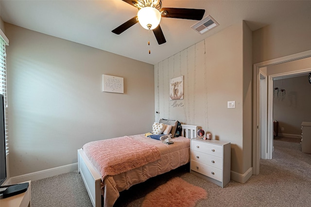 2625 Blooming Field Ln, Conroe, TX 77385 - bedroom with light colored carpet, baseboards, and a ceiling fan