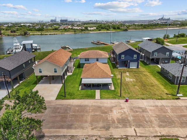 614 W 1st St, Freeport, TX 77541 - aerial perspective of suburban area with a nearby body of water