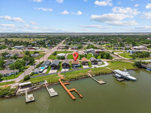 614 W 1st St, Freeport, TX 77541 - aerial view of residential area with a nearby body of water