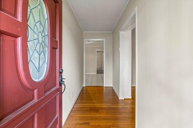 309 Helen Dr, Deer Park, TX 77536 - entrance foyer featuring wood finished floors and ornamental molding