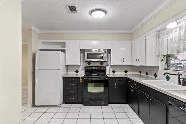 309 Helen Dr, Deer Park, TX 77536 - kitchen with black appliances, white cabinetry, dark cabinetry, open shelves, and ornamental molding