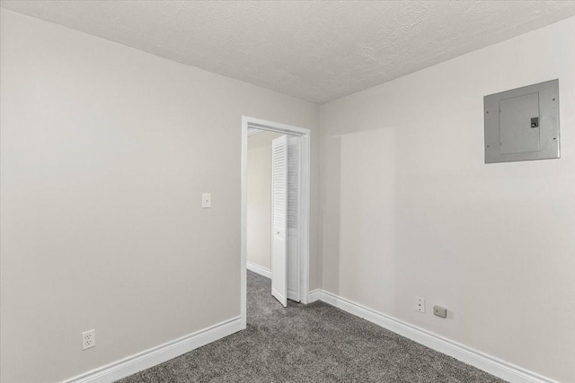 309 Helen Dr, Deer Park, TX 77536 - empty room featuring electric panel, carpet floors, and a textured ceiling