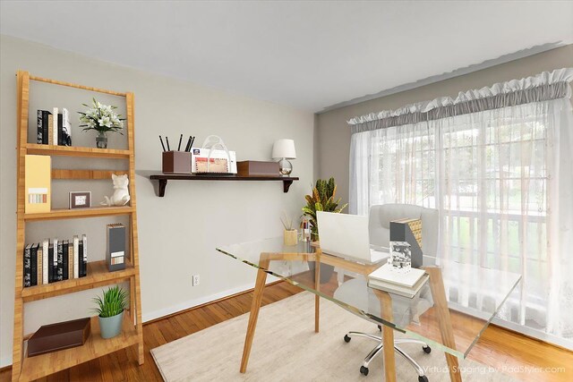 309 Helen Dr, Deer Park, TX 77536 - office area featuring wood finished floors and baseboards