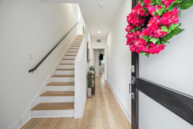 1234 W 25th St Unit A, Houston, TX 77008 - stairway featuring hardwood / wood-style floors, recessed lighting, and baseboards