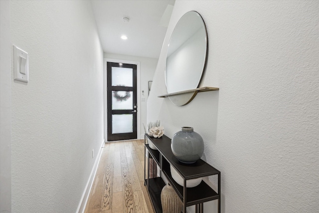 1234 W 25th St Unit A, Houston, TX 77008 - doorway to outside with a textured wall, hardwood / wood-style flooring, and recessed lighting