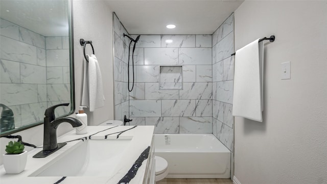14223 Edenglen Dr, Houston, TX 77049 - bathroom featuring vanity, toilet, and washtub / shower combination