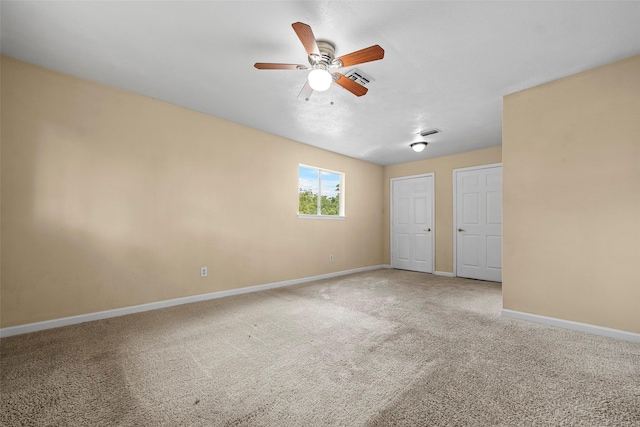6639 Feather Creek Dr, Houston, TX 77086 - carpeted empty room featuring ceiling fan and baseboards