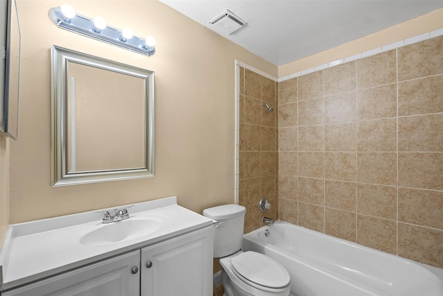 6639 Feather Creek Dr, Houston, TX 77086 - bathroom with toilet, vanity, and bathing tub / shower combination