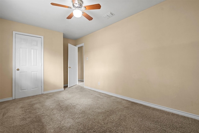 6639 Feather Creek Dr, Houston, TX 77086 - unfurnished bedroom with carpet flooring, baseboards, and a ceiling fan