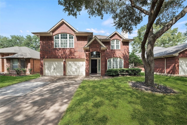 4131 N New Meadows Dr, Sugar Land, TX 77479 - traditional home with brick siding, a garage, a front lawn, and driveway