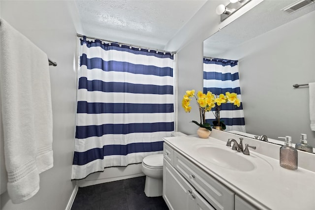 4131 N New Meadows Dr, Sugar Land, TX 77479 - full bathroom featuring toilet, vanity, tile patterned flooring, a textured ceiling, and baseboards