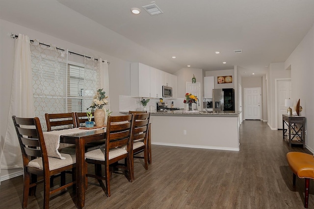 309 Cumberland Forest Dr, Magnolia, TX 77354 - dining area featuring dark wood-type flooring, recessed lighting, and baseboards