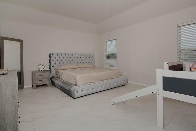 309 Cumberland Forest Dr, Magnolia, TX 77354 - bedroom featuring vaulted ceiling and baseboards