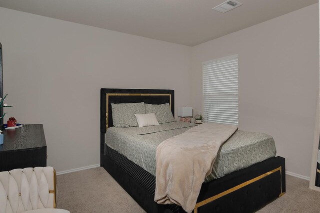 309 Cumberland Forest Dr, Magnolia, TX 77354 - carpeted bedroom featuring baseboards