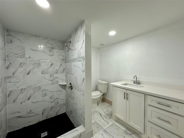 4613 Dewberry St, Houston, TX 77021 - full bathroom featuring toilet, a marble finish shower, vanity, marble finish floors, and recessed lighting