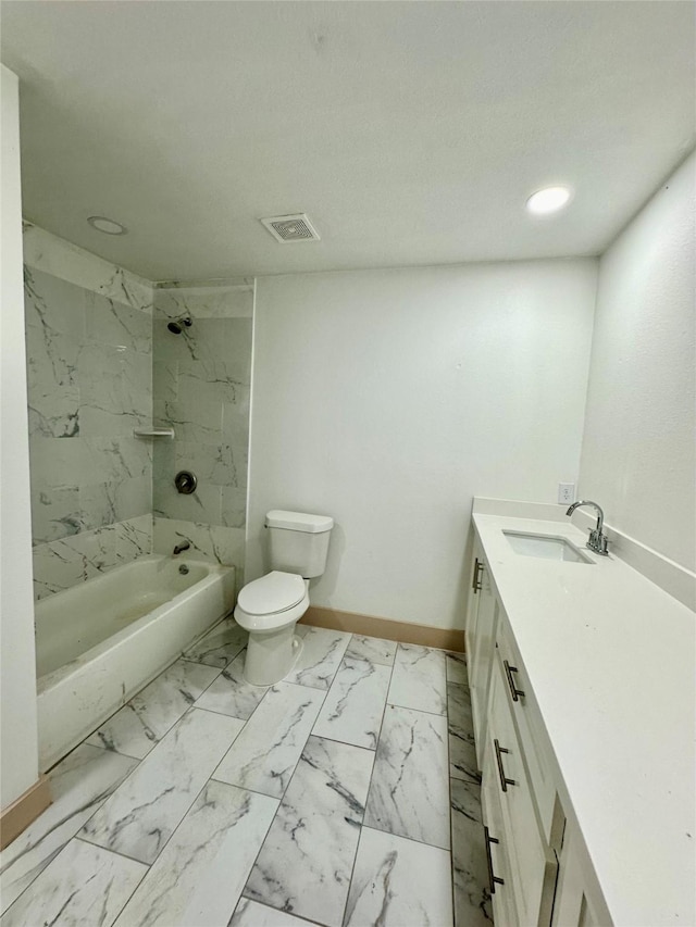4613 Dewberry St, Houston, TX 77021 - full bath with vanity, toilet, marble look tile flooring, baseboards, and shower / washtub combination