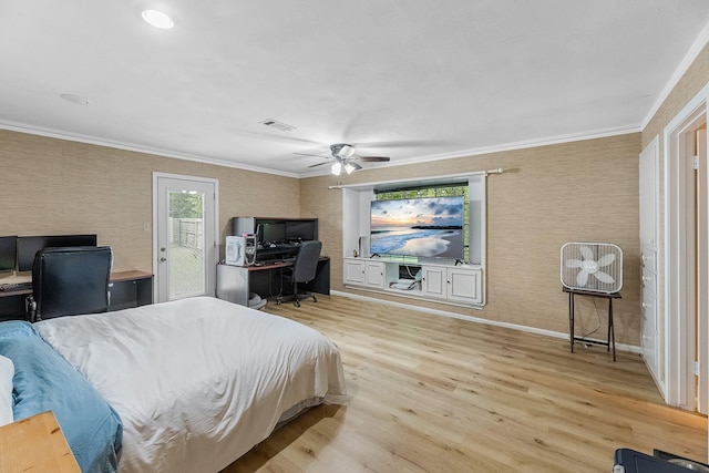 457 Monticello Park, Conroe, TX 77302 - bedroom with a desk, wood finished floors, access to outside, ornamental molding, and baseboards