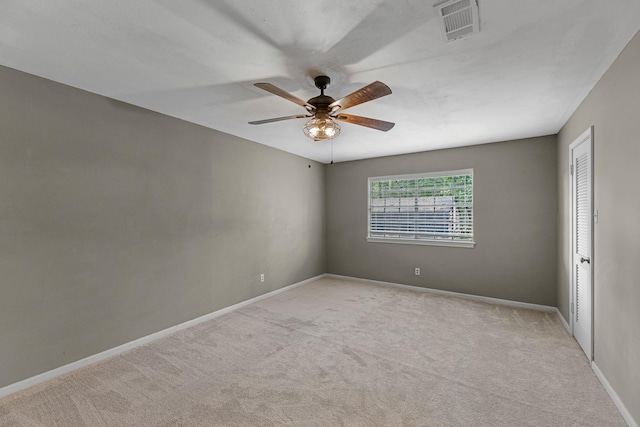 457 Monticello Park, Conroe, TX 77302 - empty room featuring light colored carpet, baseboards, and ceiling fan