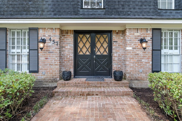 457 Monticello Park, Conroe, TX 77302 - entrance to property featuring brick siding and a shingled roof