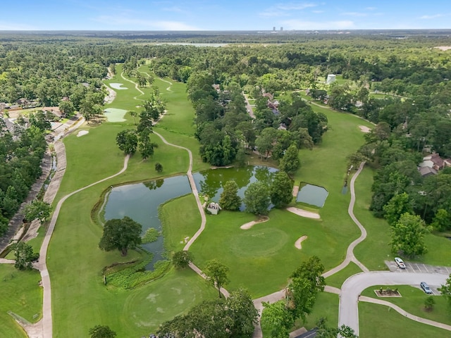 457 Monticello Park, Conroe, TX 77302 - view of property location featuring a large body of water, a forest, and a golf club