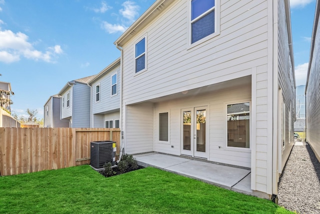 1108 Dart St, Houston, TX 77007 - rear view of house featuring central AC, a patio, and french doors