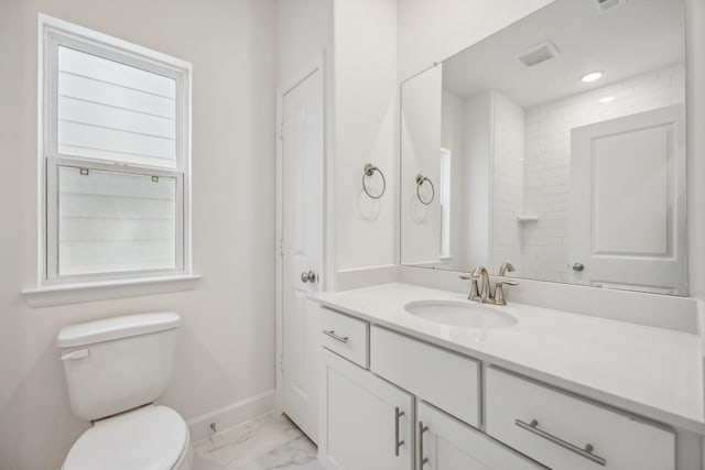1108 Dart St, Houston, TX 77007 - bathroom featuring marble finish flooring, baseboards, toilet, and vanity