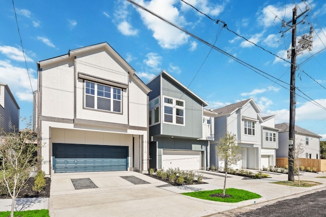 1108 Dart St, Houston, TX 77007 - view of front facade featuring a garage, driveway, a residential view, board and batten siding, and stucco siding