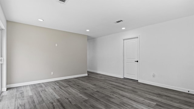 8603 Twisting Vine Ln, Houston, TX 77040 - unfurnished room featuring recessed lighting, dark wood-type flooring, and baseboards