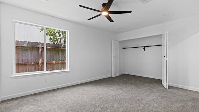 8603 Twisting Vine Ln, Houston, TX 77040 - unfurnished bedroom featuring carpet floors, baseboards, a closet, and ceiling fan