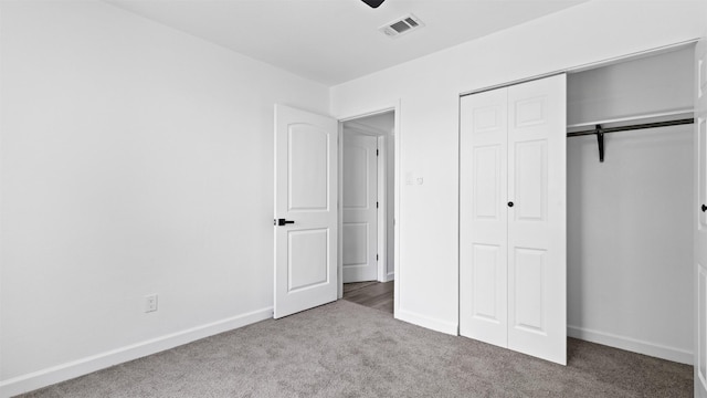 8603 Twisting Vine Ln, Houston, TX 77040 - unfurnished bedroom with carpet flooring, a closet, and baseboards