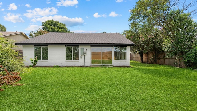 8603 Twisting Vine Ln, Houston, TX 77040 - back of property featuring roof with shingles and brick siding