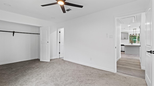 8603 Twisting Vine Ln, Houston, TX 77040 - unfurnished bedroom featuring attic access, carpet, baseboards, and a closet