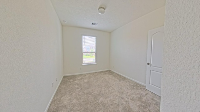 4322 Mossy Banks Ln, Houston, TX 77068 - empty room with carpet, baseboards, and a textured ceiling