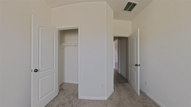 4322 Mossy Banks Ln, Houston, TX 77068 - unfurnished bedroom with light carpet, baseboards, and a closet