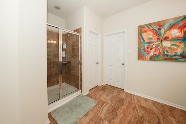 3314 Tall Sycamore Trl, Katy, TX 77493 - bathroom with a shower stall and baseboards