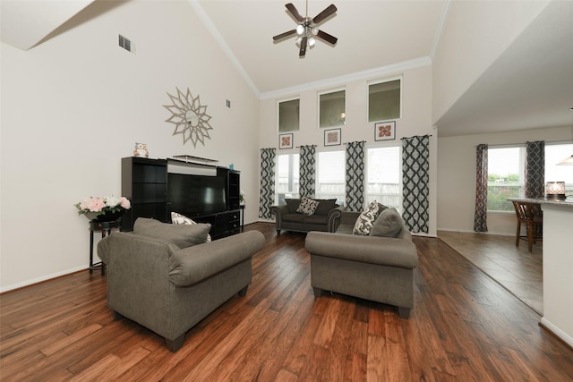 3314 Tall Sycamore Trl, Katy, TX 77493 - living room with high vaulted ceiling, ceiling fan, crown molding, wood finished floors, and baseboards