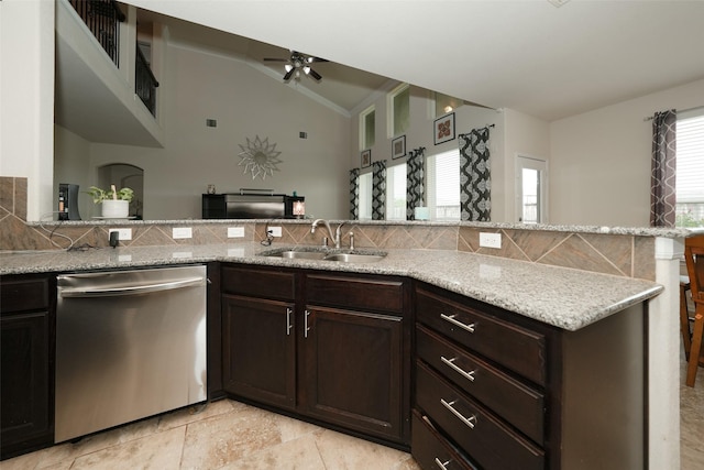 3314 Tall Sycamore Trl, Katy, TX 77493 - kitchen with dishwasher, a sink, vaulted ceiling, dark brown cabinetry, and a ceiling fan