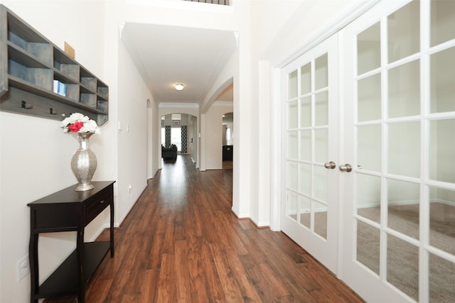 3314 Tall Sycamore Trl, Katy, TX 77493 - hall with arched walkways, french doors, dark wood-style flooring, and baseboards