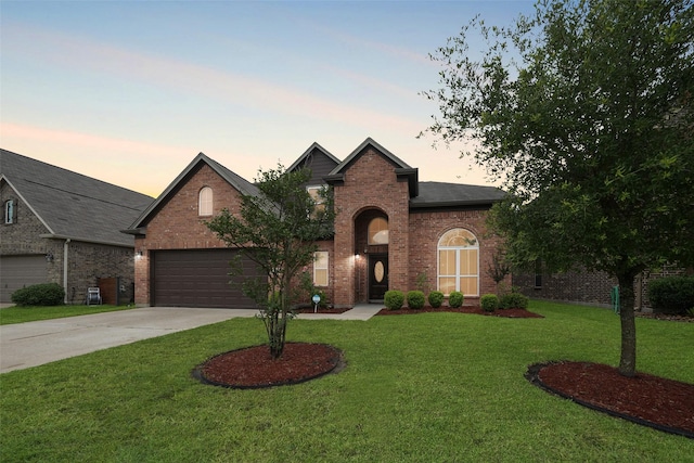 3314 Tall Sycamore Trl, Katy, TX 77493 - traditional-style home with brick siding, driveway, a front yard, and an attached garage