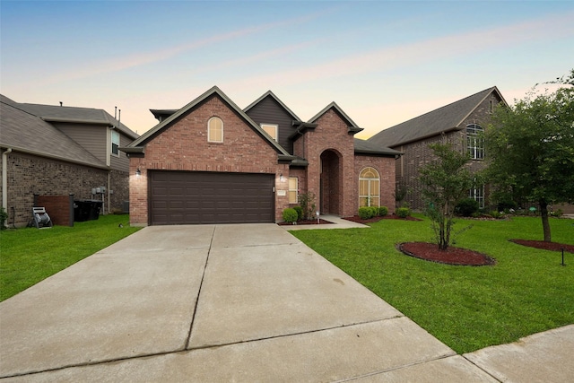 3314 Tall Sycamore Trl, Katy, TX 77493 - traditional home with a lawn, brick siding, and concrete driveway