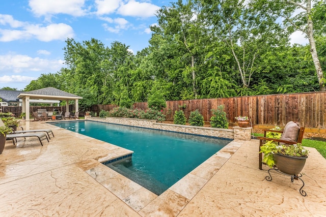 212 Salmon Creek Ln, Friendswood, TX 77546 - view of swimming pool with a gazebo, a patio area, and a fenced backyard