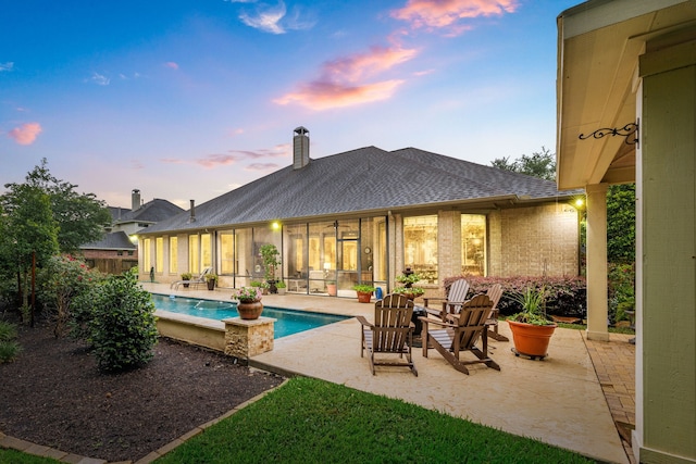 212 Salmon Creek Ln, Friendswood, TX 77546 - swimming pool featuring a patio area