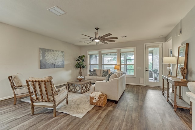 109 Pepper Grass Pl, Montgomery, TX 77316 - living room with wood finished floors, ceiling fan, and baseboards