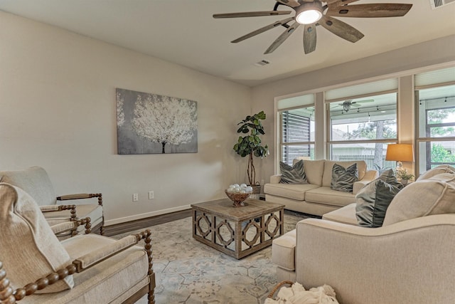 109 Pepper Grass Pl, Montgomery, TX 77316 - living area featuring baseboards, wood finished floors, and a ceiling fan