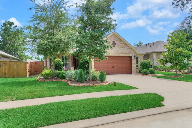109 Pepper Grass Pl, Montgomery, TX 77316 - view of front of property featuring brick siding, a garage, concrete driveway, and a gate