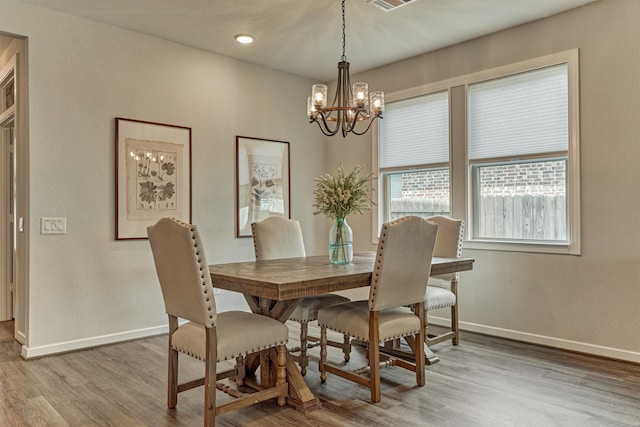 109 Pepper Grass Pl, Montgomery, TX 77316 - dining room featuring wood finished floors, a chandelier, baseboards, and recessed lighting