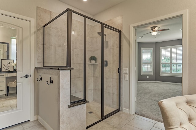 109 Pepper Grass Pl, Montgomery, TX 77316 - full bathroom featuring ceiling fan, baseboards, a stall shower, and tile patterned floors