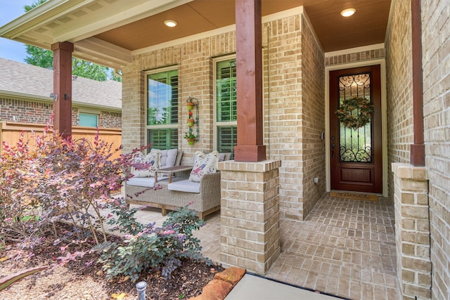 109 Pepper Grass Pl, Montgomery, TX 77316 - entrance to property with brick siding, covered porch, and a shingled roof