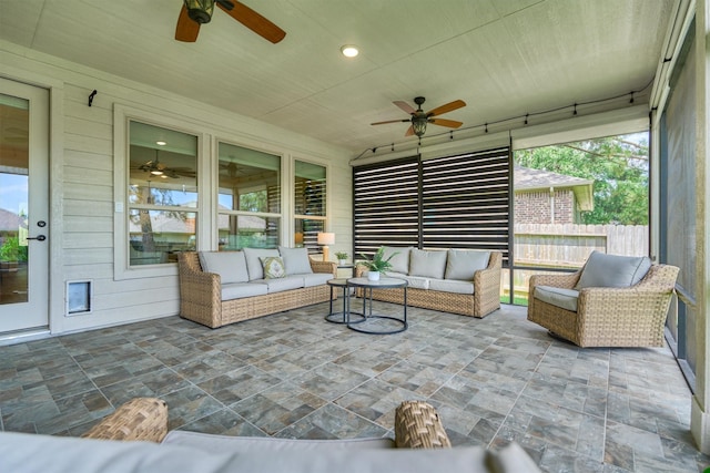 109 Pepper Grass Pl, Montgomery, TX 77316 - sunroom / solarium with a ceiling fan and outdoor lounge area
